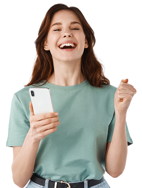 Happy woman celebrating with her phone