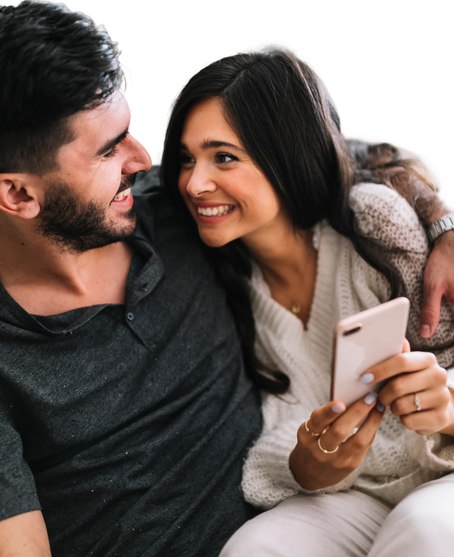 Couple looking at a phone together